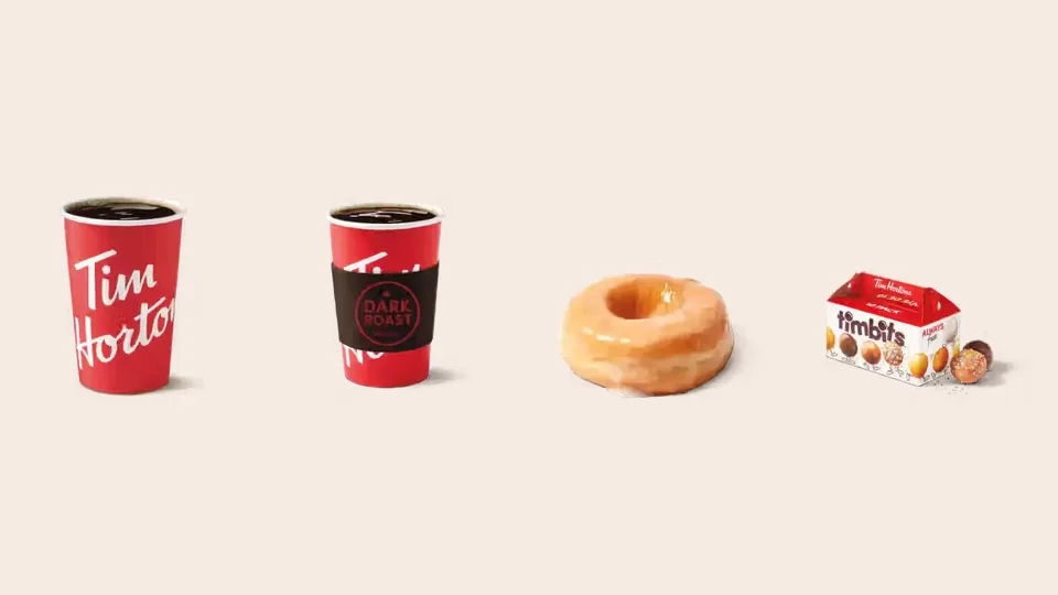 A Tim Hortons brewed coffee, Dark Roast coffee, Honey Dip donut and box of Timbits