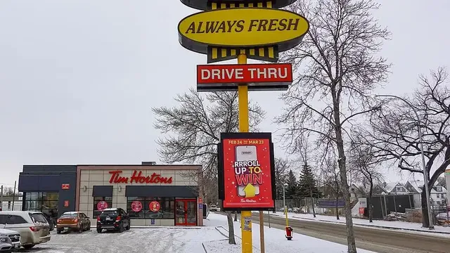 A Tim Hortons Always Fresh sign outside a restaurant in Winnipeg, Manitoba